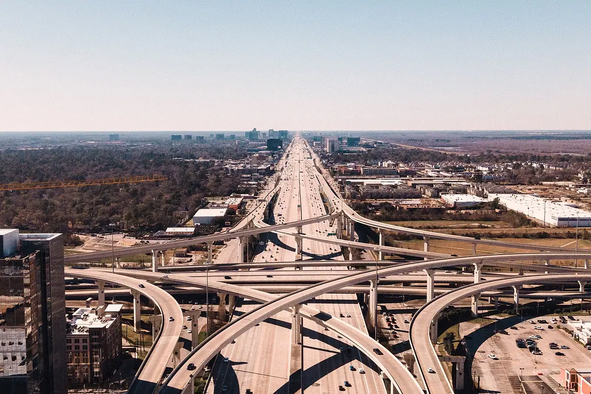 Aerial view of a multilevel highway interchange in Houston, Texas.